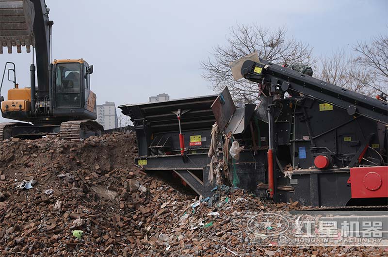 履帶液壓巖石破碎機用于建筑垃圾再生處理